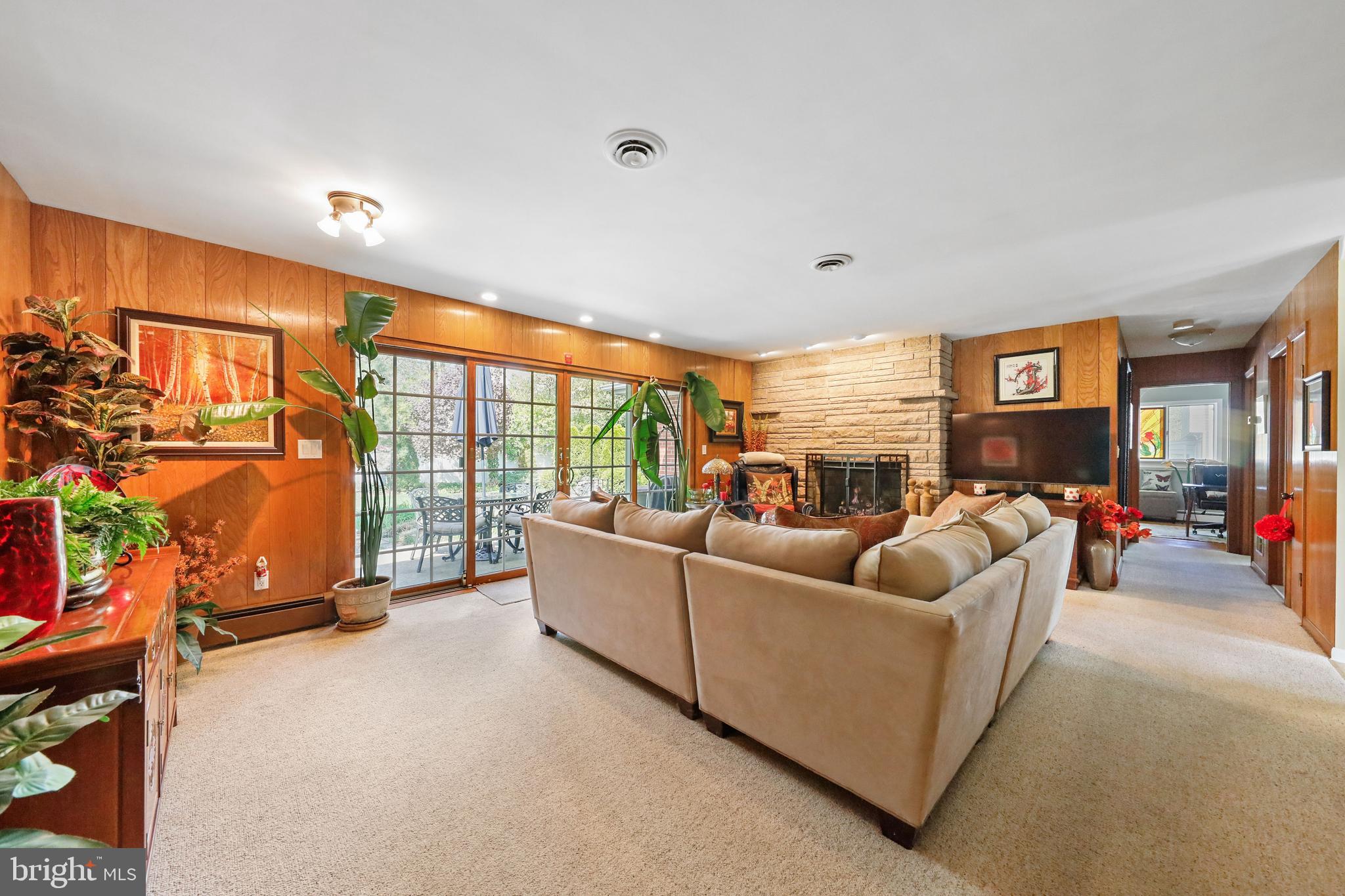 19 Diane Drive Ewing, NJ 08628 - Photo 19 of 38 a living room with furniture and a flat screen tv