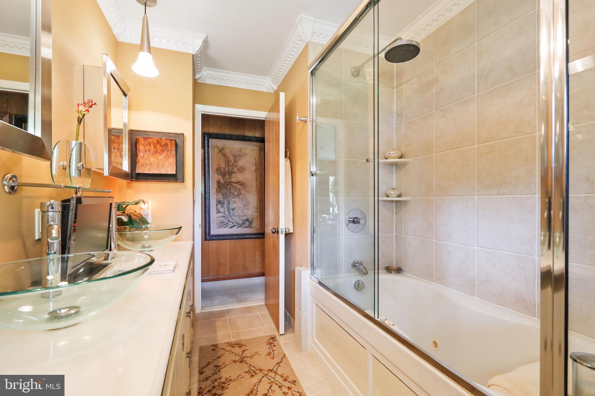 19 Diane Drive Ewing, NJ 08628 - Photo 26 of 38 a bathroom with a bathtub and a shower