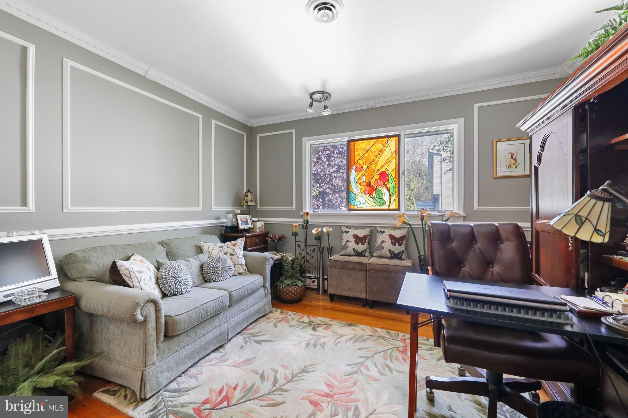 19 Diane Drive Ewing, NJ 08628 - Photo 29 of 38 a living room with furniture and a flat screen tv