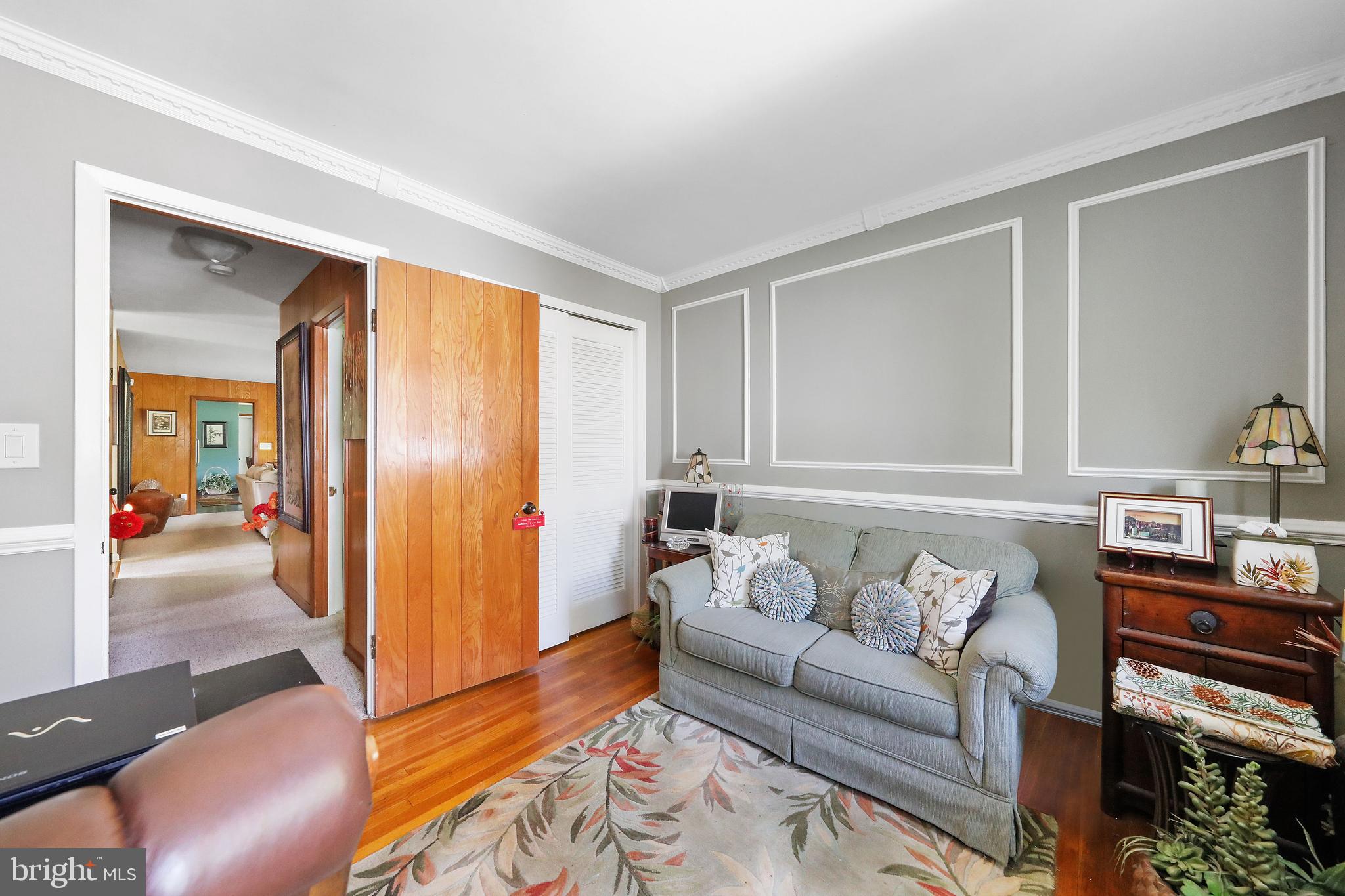 19 Diane Drive Ewing, NJ 08628 - Photo 30 of 38 a living room with furniture and wooden floor