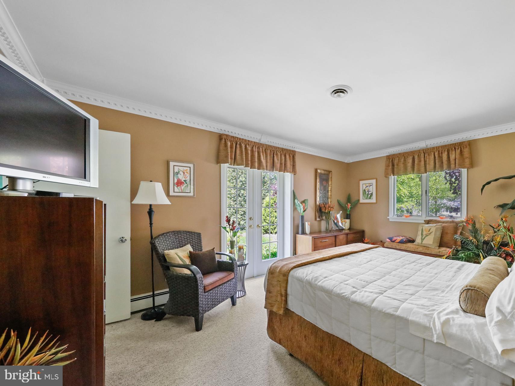 19 Diane Drive Ewing, NJ 08628 - Photo 31 of 38 a spacious bedroom with a bed and a large window