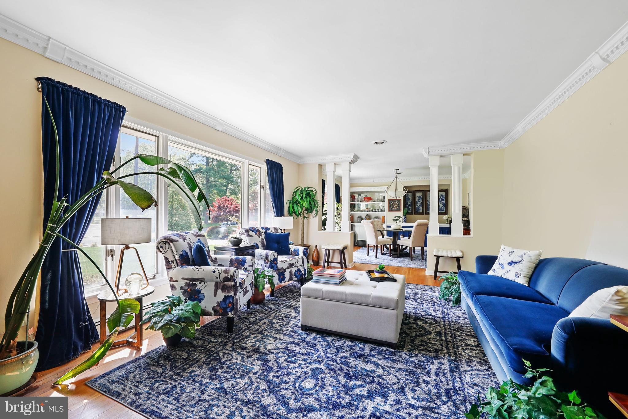 19 Diane Drive Ewing, NJ 08628 - Photo 8 of 38 a living room with furniture a rug and a chandelier