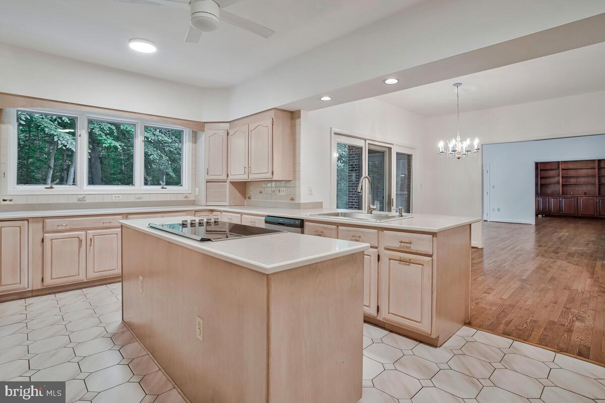3170 Hickory Ridge Road Dunkirk, MD 20754 - Photo 17 of 74 a kitchen with a sink stove and cabinets
