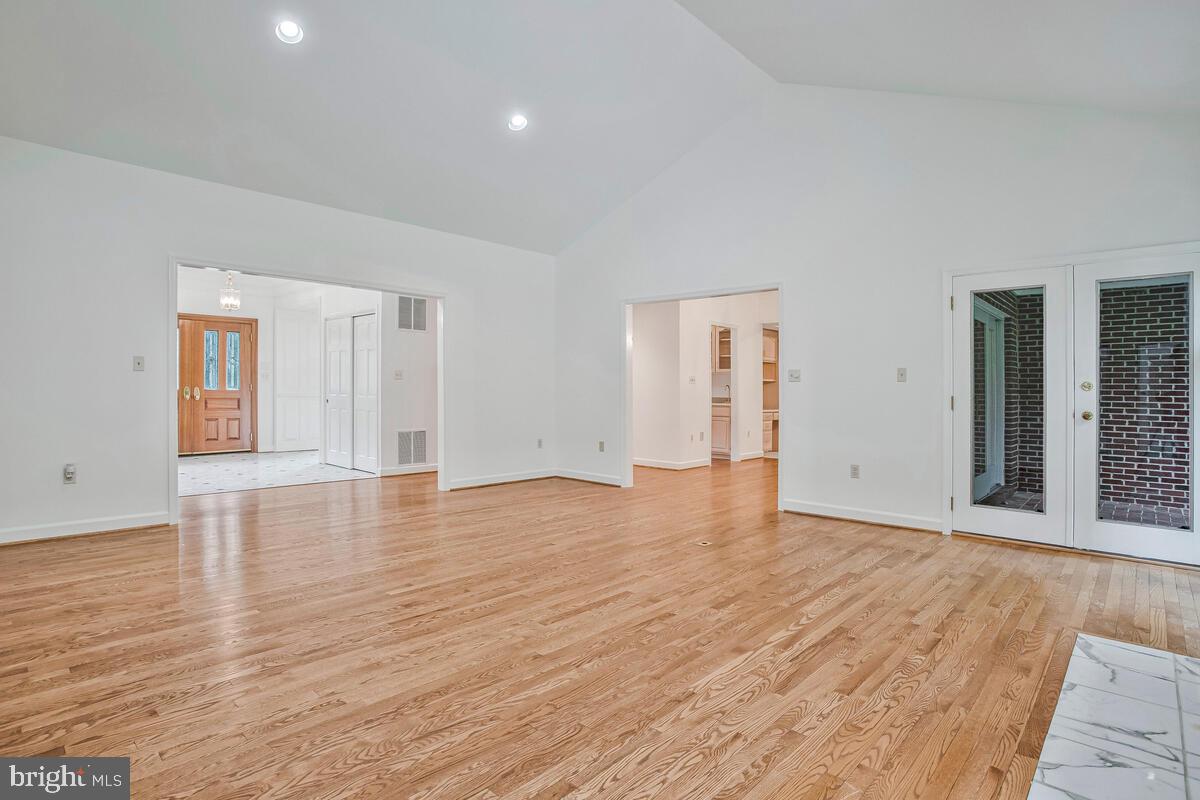 3170 Hickory Ridge Road Dunkirk, MD 20754 - Photo 24 of 74 a view of an empty room with wooden floor and windows