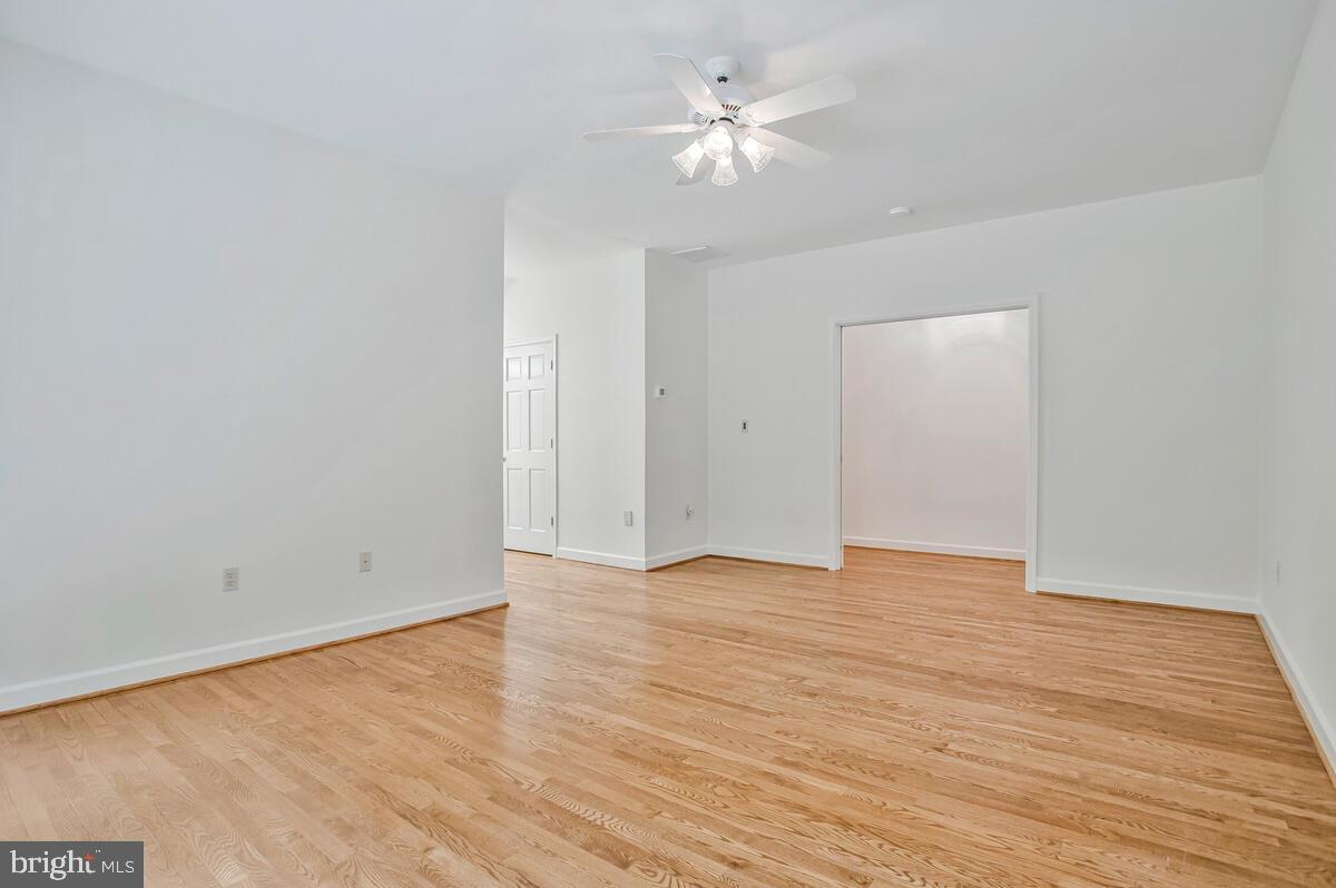 3170 Hickory Ridge Road Dunkirk, MD 20754 - Photo 28 of 74 a view of an empty room with wooden floor