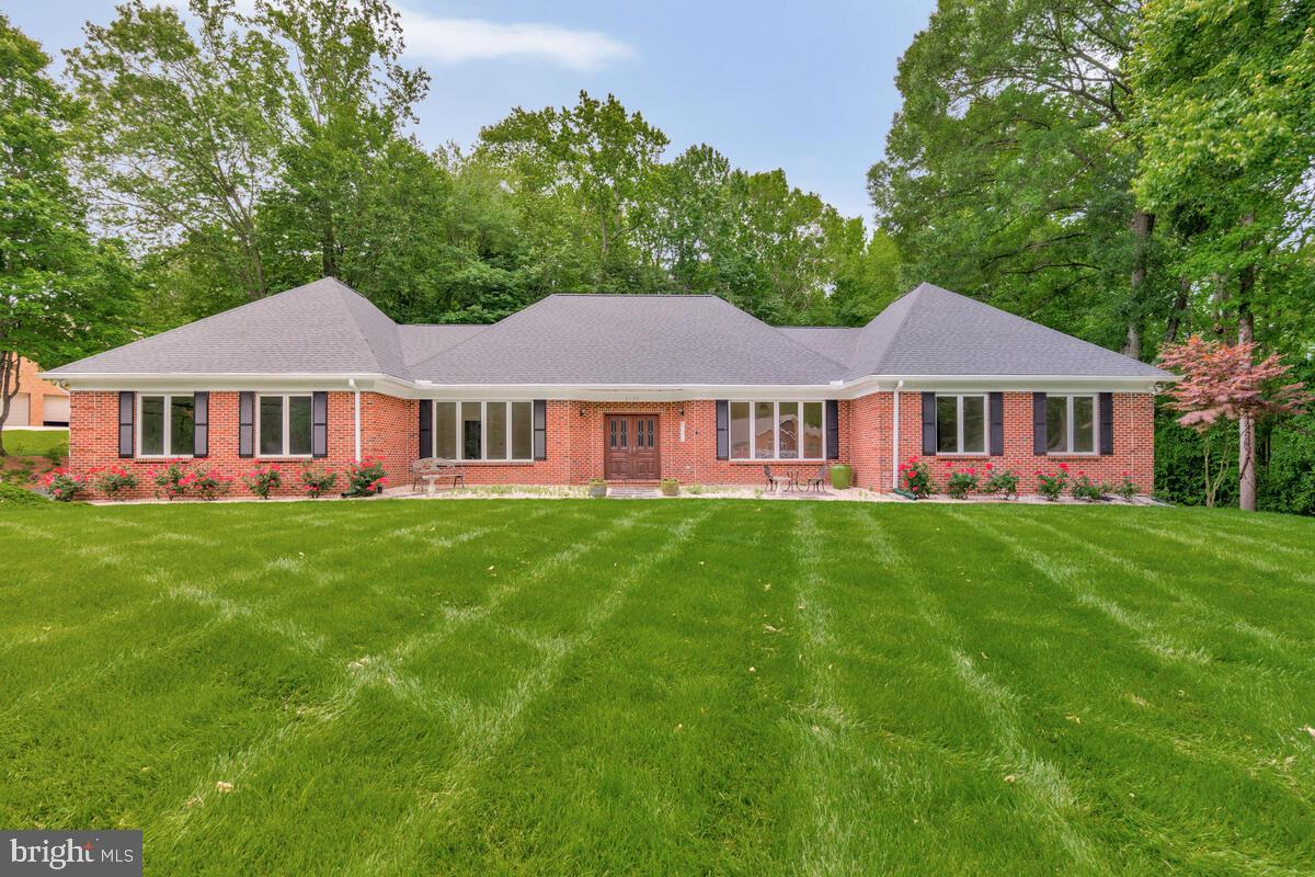 3170 Hickory Ridge Road Dunkirk, MD 20754 - Photo 3 of 74 a front view of a house with a garden