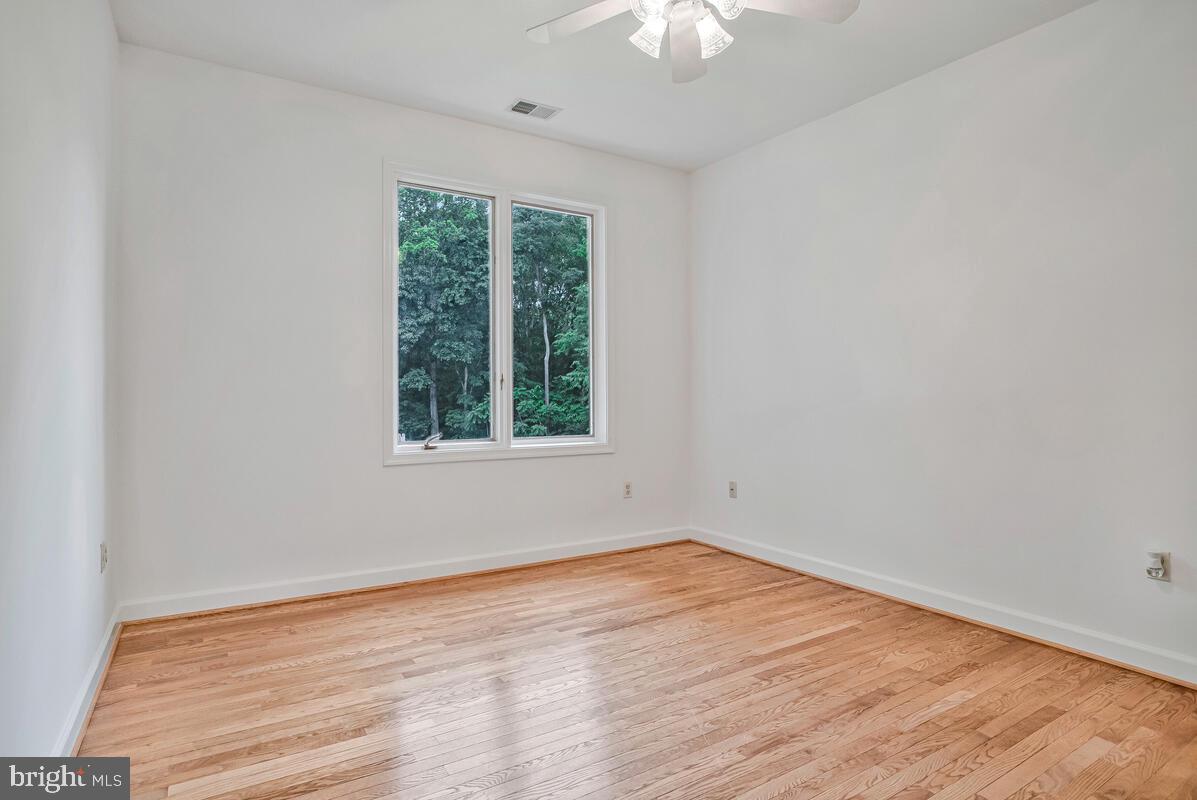 3170 Hickory Ridge Road Dunkirk, MD 20754 - Photo 38 of 74 wooden floor in an empty room with a window