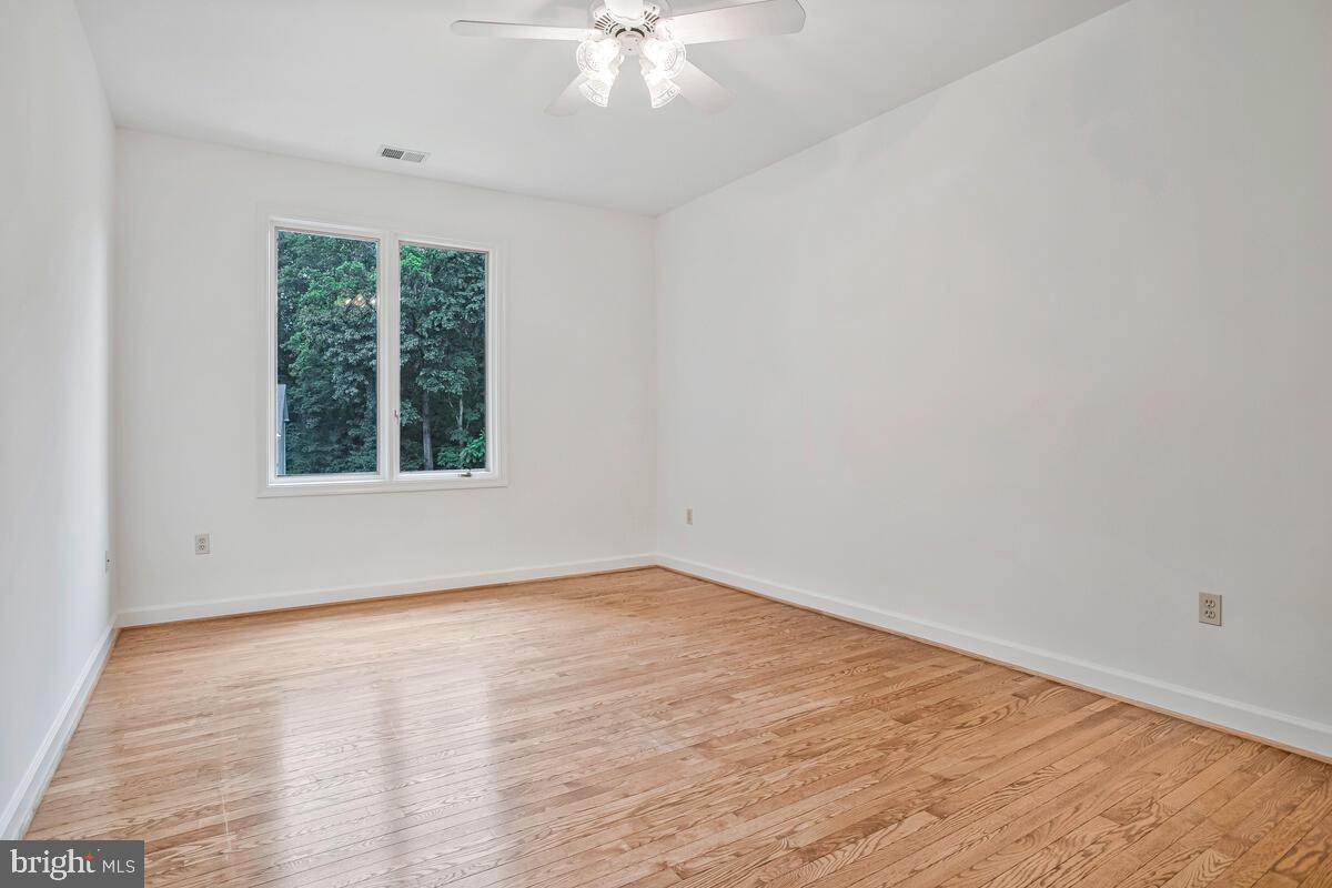 3170 Hickory Ridge Road Dunkirk, MD 20754 - Photo 39 of 74 wooden floor in an empty room with a window