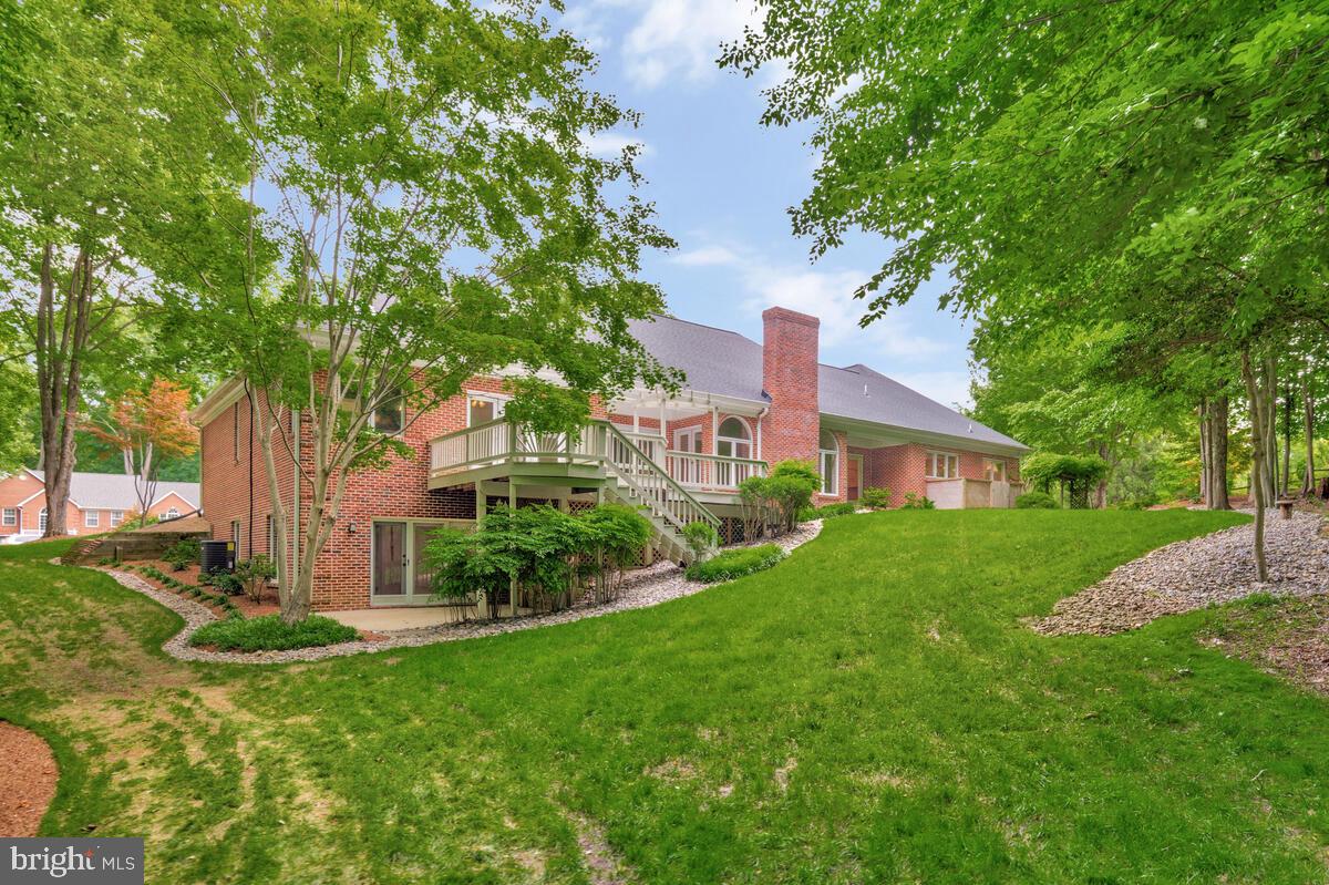 3170 Hickory Ridge Road Dunkirk, MD 20754 - Photo 54 of 74 a view of a house with a big yard plants and large trees