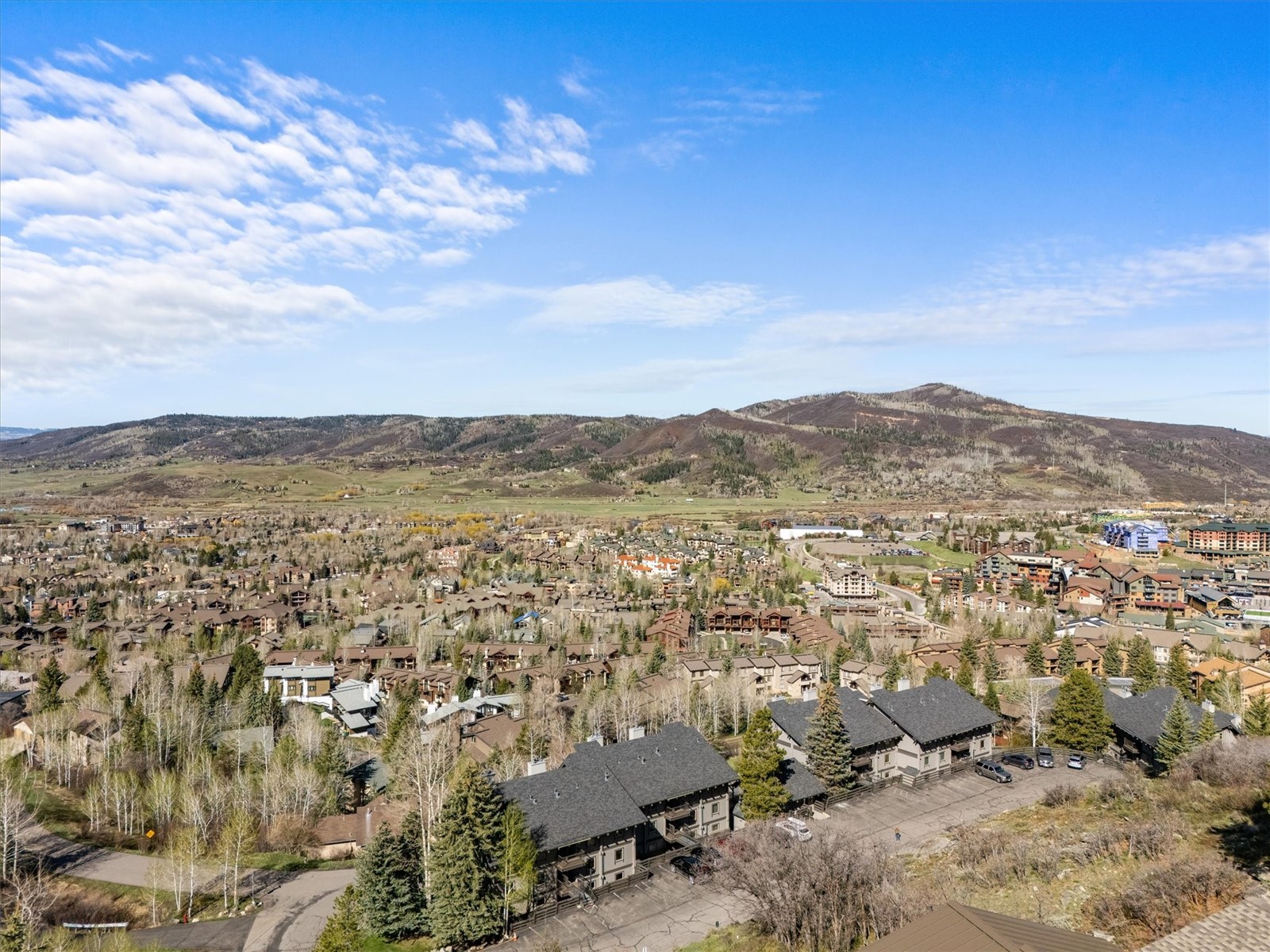 2602 Longthong Road, Unit 107 Steamboat Springs, CO 80487 - Photo 30 of 32 an aerial view of residential building and trees around