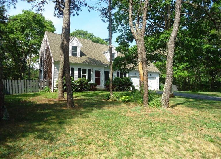 261 Simon Narrows Road Mashpee, MA 02649 - Photo 17 of 17 a view of a house with a yard and a tree
