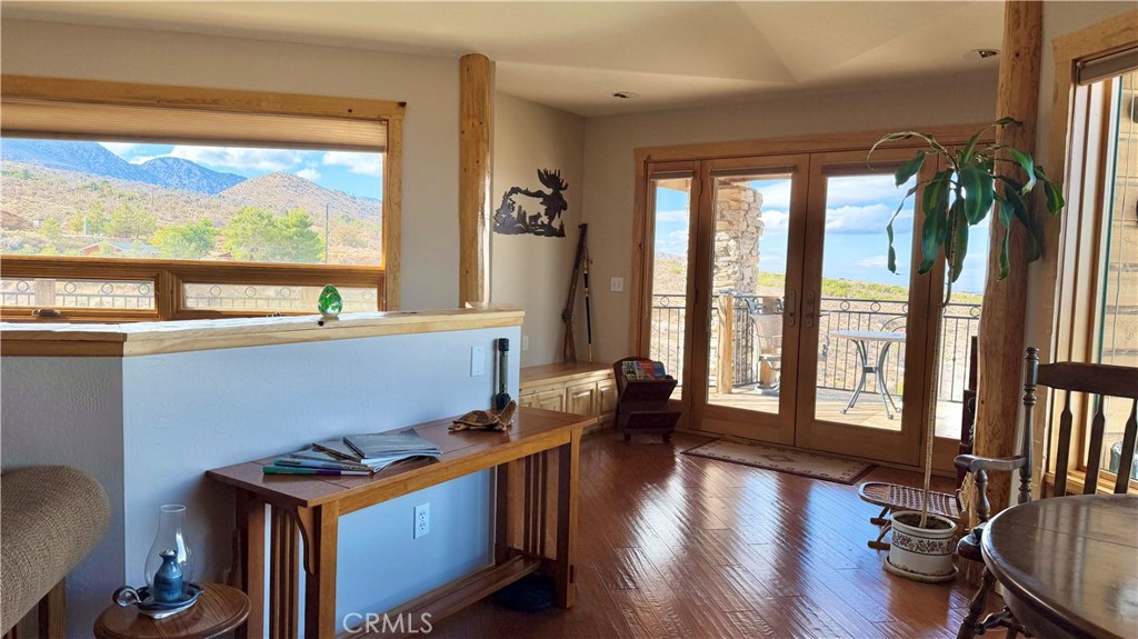 275 Canyon Road Pinon Hills, CA 92372 - Photo 11 of 68 a view of workspace with wooden floor and windows