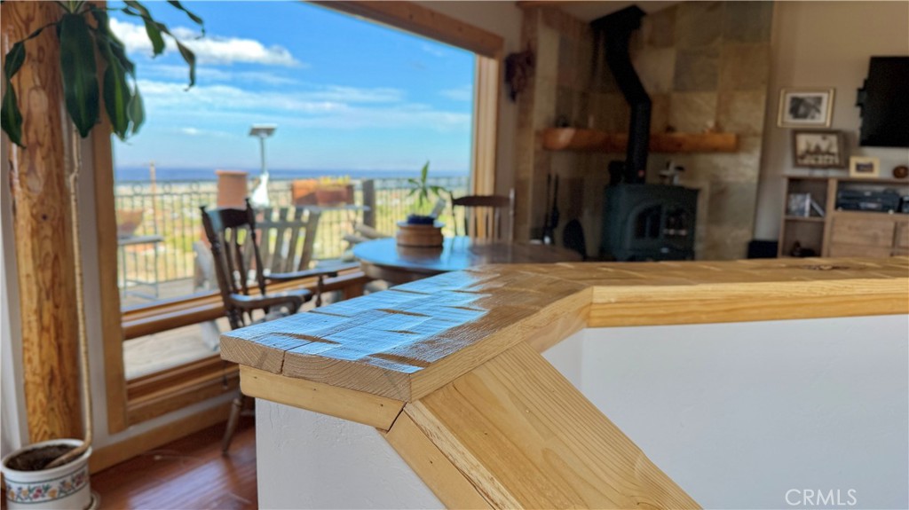 275 Canyon Road Pinon Hills, CA 92372 - Photo 13 of 68 a view of a living room and kitchen