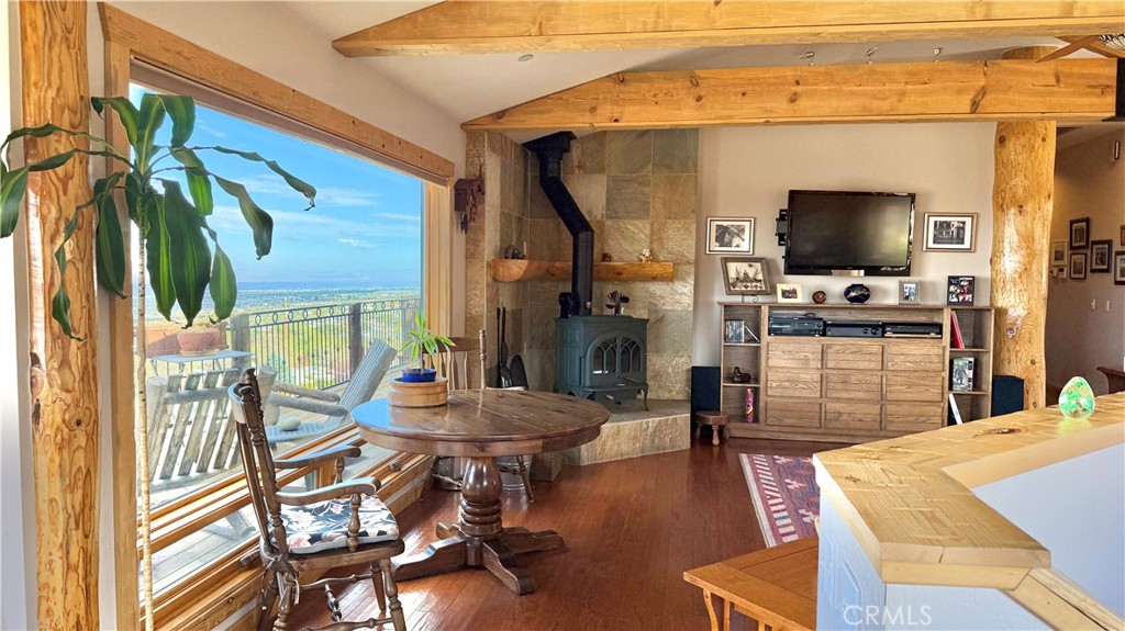 275 Canyon Road Pinon Hills, CA 92372 - Photo 14 of 68 a living room with furniture and a flat screen tv