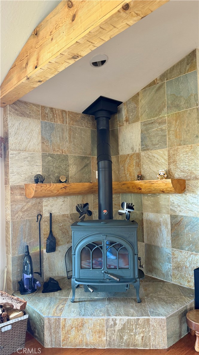 275 Canyon Road Pinon Hills, CA 92372 - Photo 25 of 68 a bathroom with a granite countertop sink and a mirror