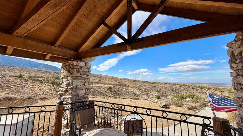 275 Canyon Road Pinon Hills, CA 92372 - Photo 41 of 68 a view of a balcony with an ocean view