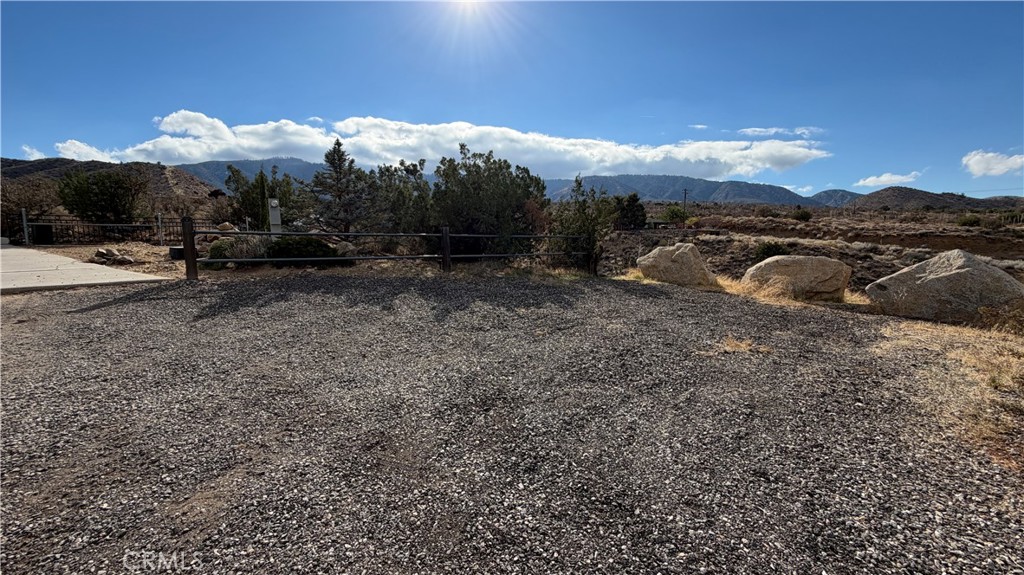 275 Canyon Road Pinon Hills, CA 92372 - Photo 64 of 68 a view of a town with large trees
