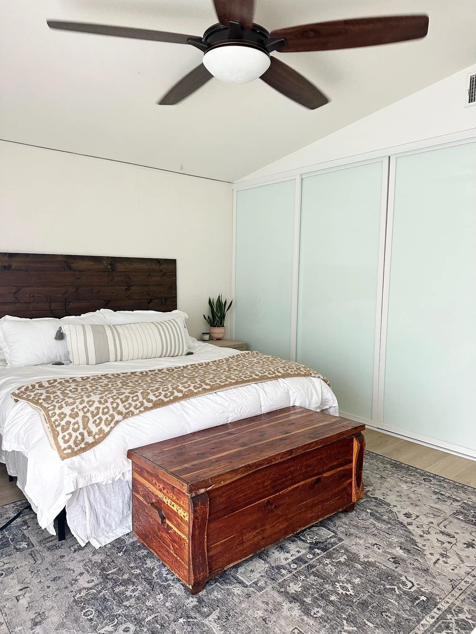 14240 Kendra Way Poway, CA 92064 - Photo 15 of 34 a bedroom with a bed and wooden floor