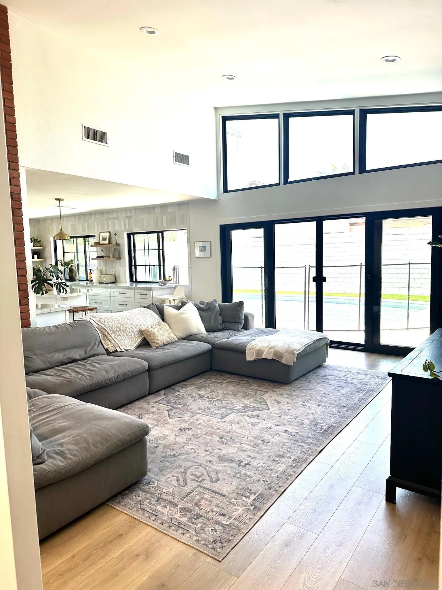 14240 Kendra Way Poway, CA 92064 - Photo 16 of 34 a living room with furniture and a large window
