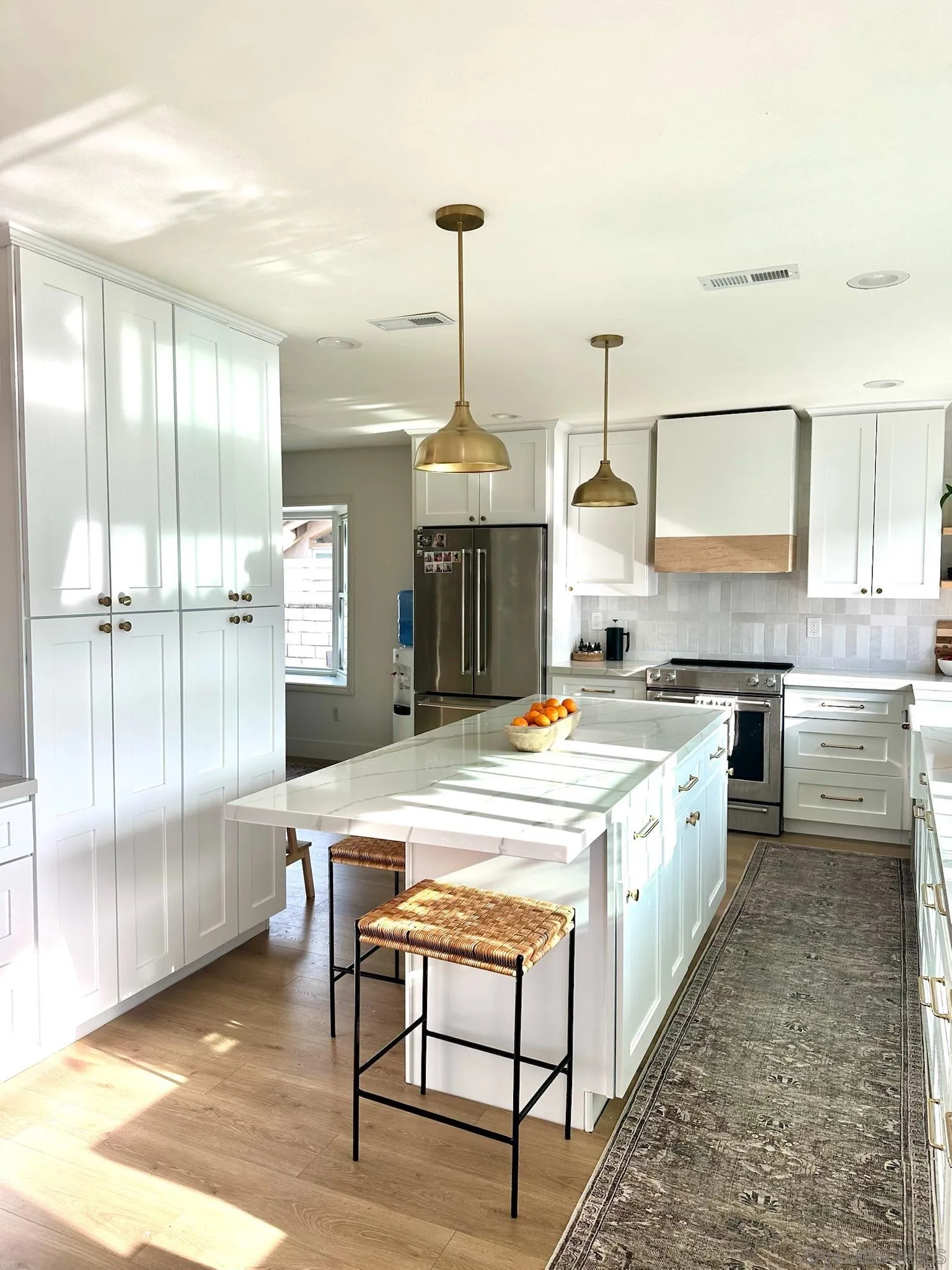 14240 Kendra Way Poway, CA 92064 - Photo 2 of 34 a kitchen with stainless steel appliances granite countertop a stove a sink and a refrigerator