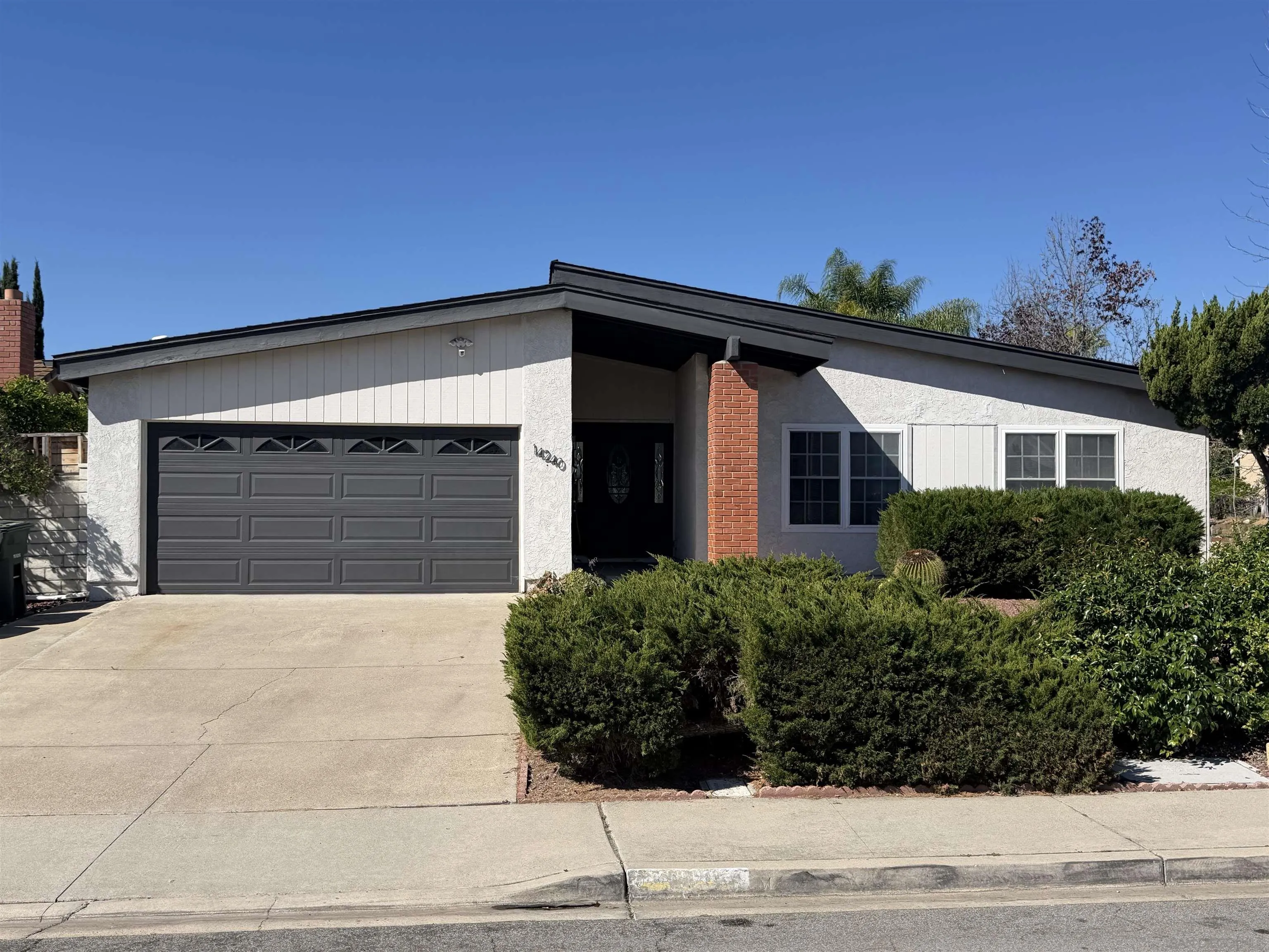 14240 Kendra Way Poway, CA 92064 - Photo 34 of 34 a front view of a house with a yard
