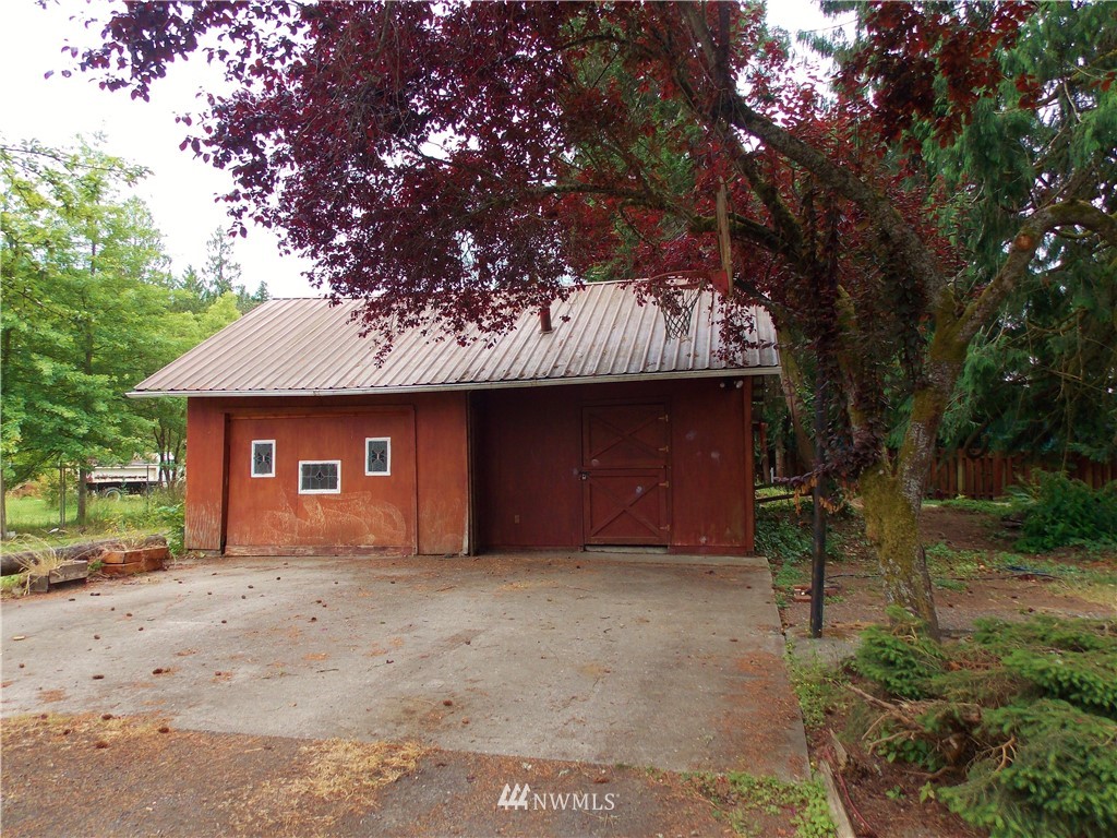 365 Chilvers Road Chehalis, WA 98532 - Photo 16 of 20 a house with lots of trees