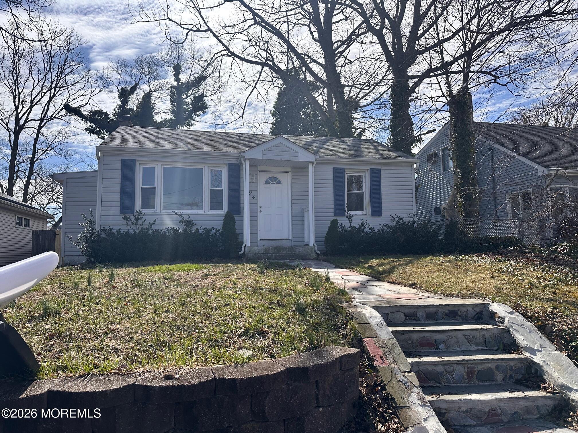 294 19th Avenue Brick, NJ 08724 - Photo 1 of 15 a view of a house with a yard covered with wooden fence