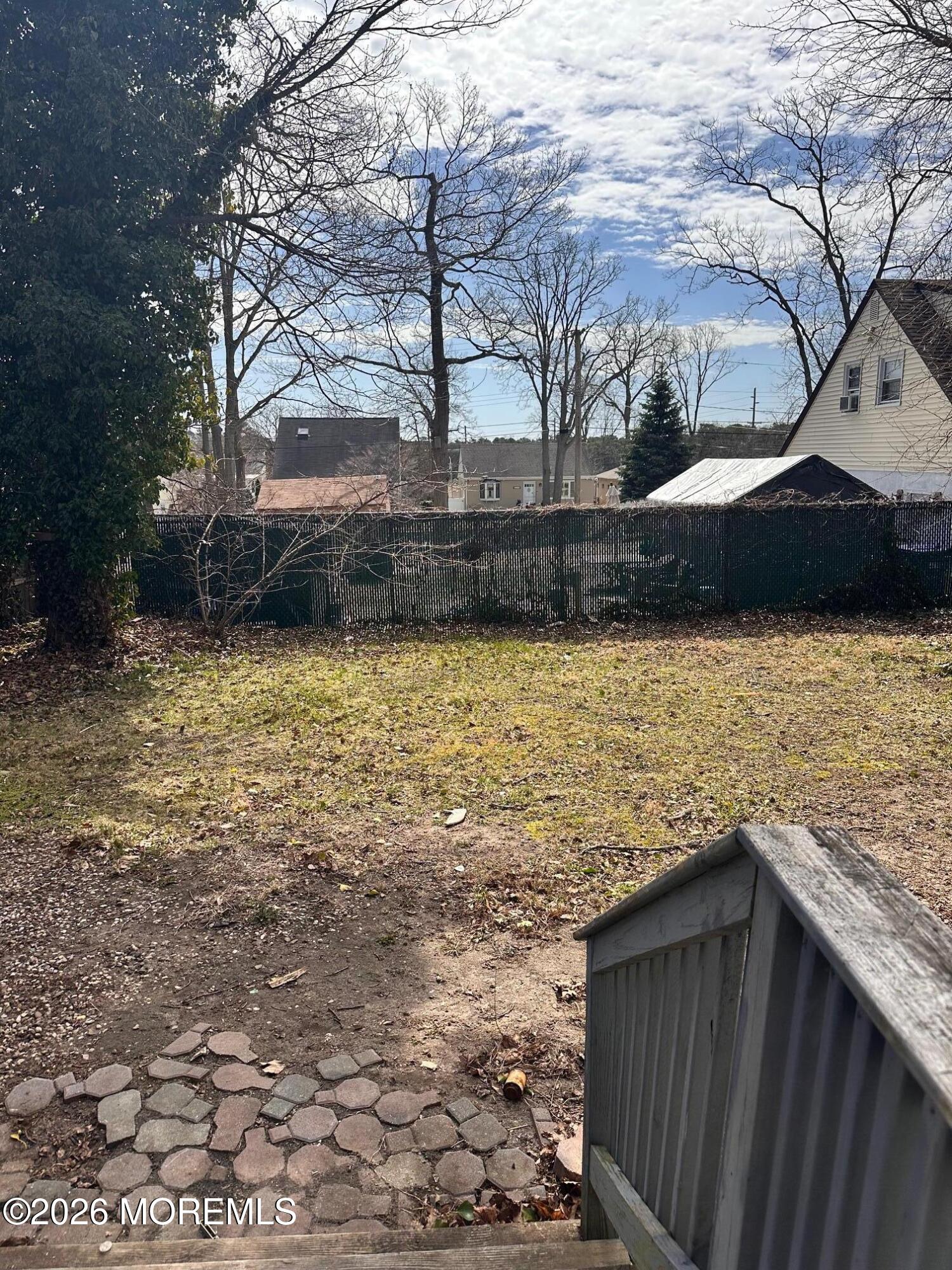 294 19th Avenue Brick, NJ 08724 - Photo 15 of 15 a view of a terrace with a bench