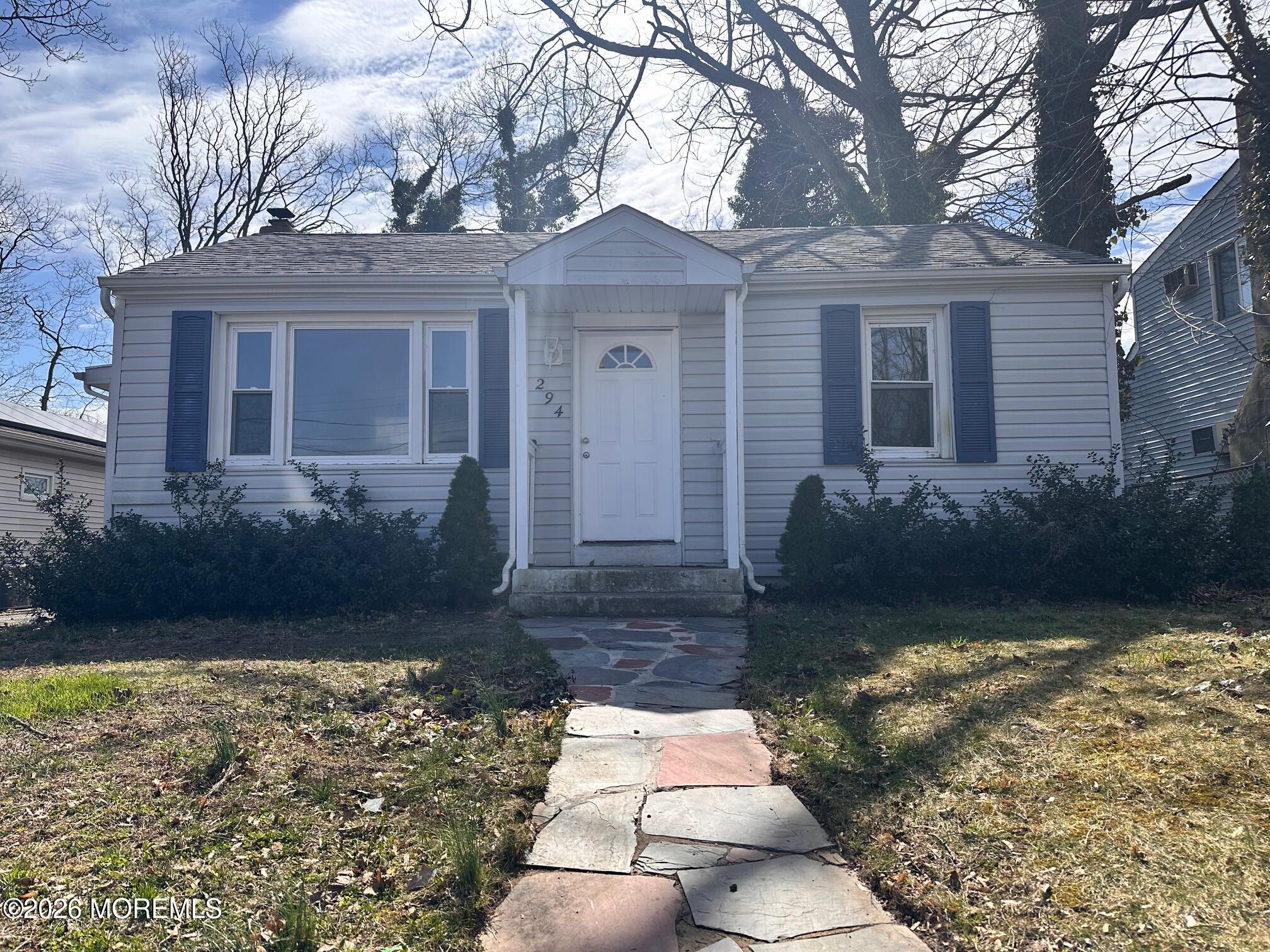 294 19th Avenue Brick, NJ 08724 - Photo 2 of 15 a front view of a house with garden