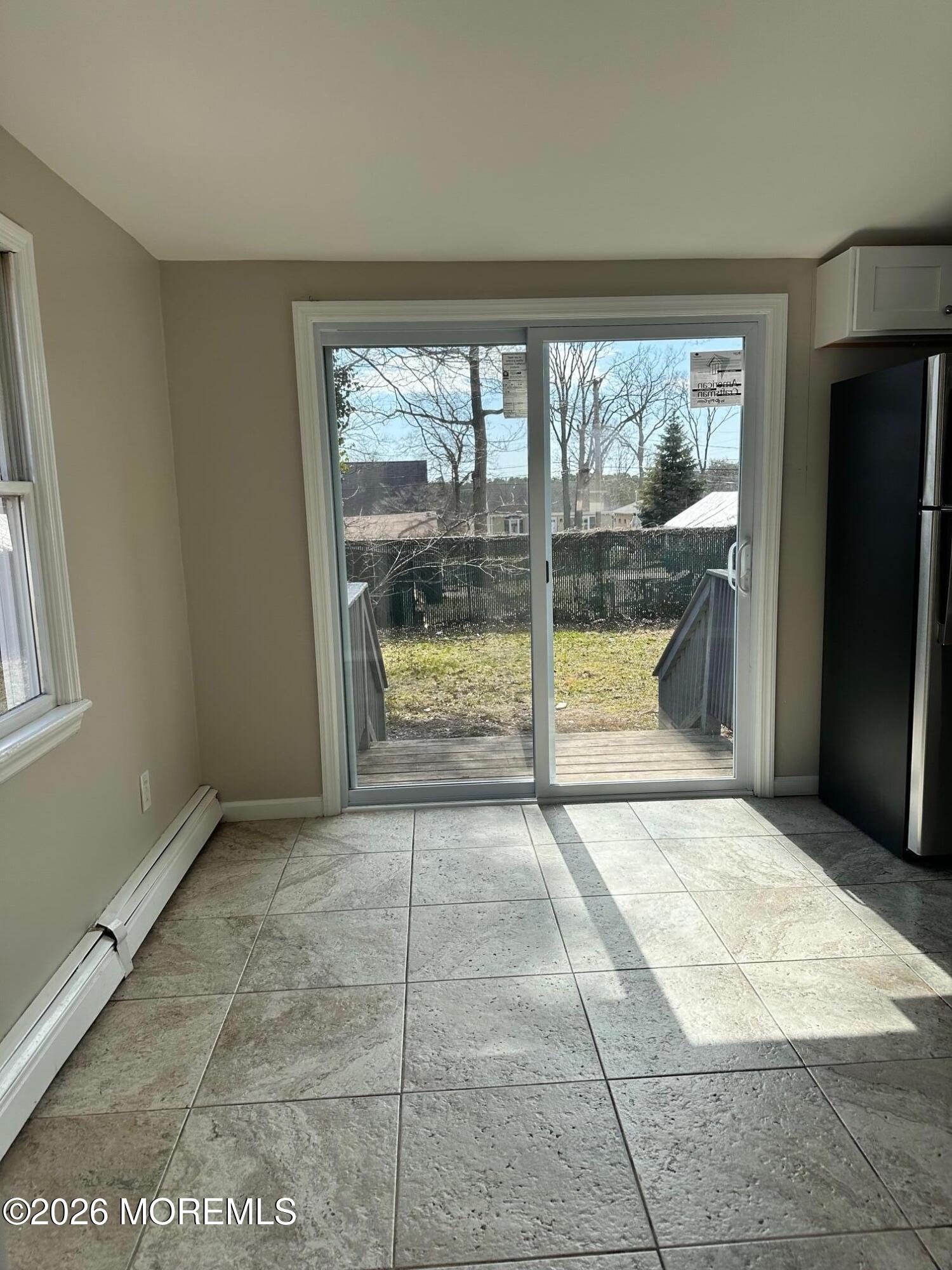 294 19th Avenue Brick, NJ 08724 - Photo 6 of 15 a view of an empty room with a window