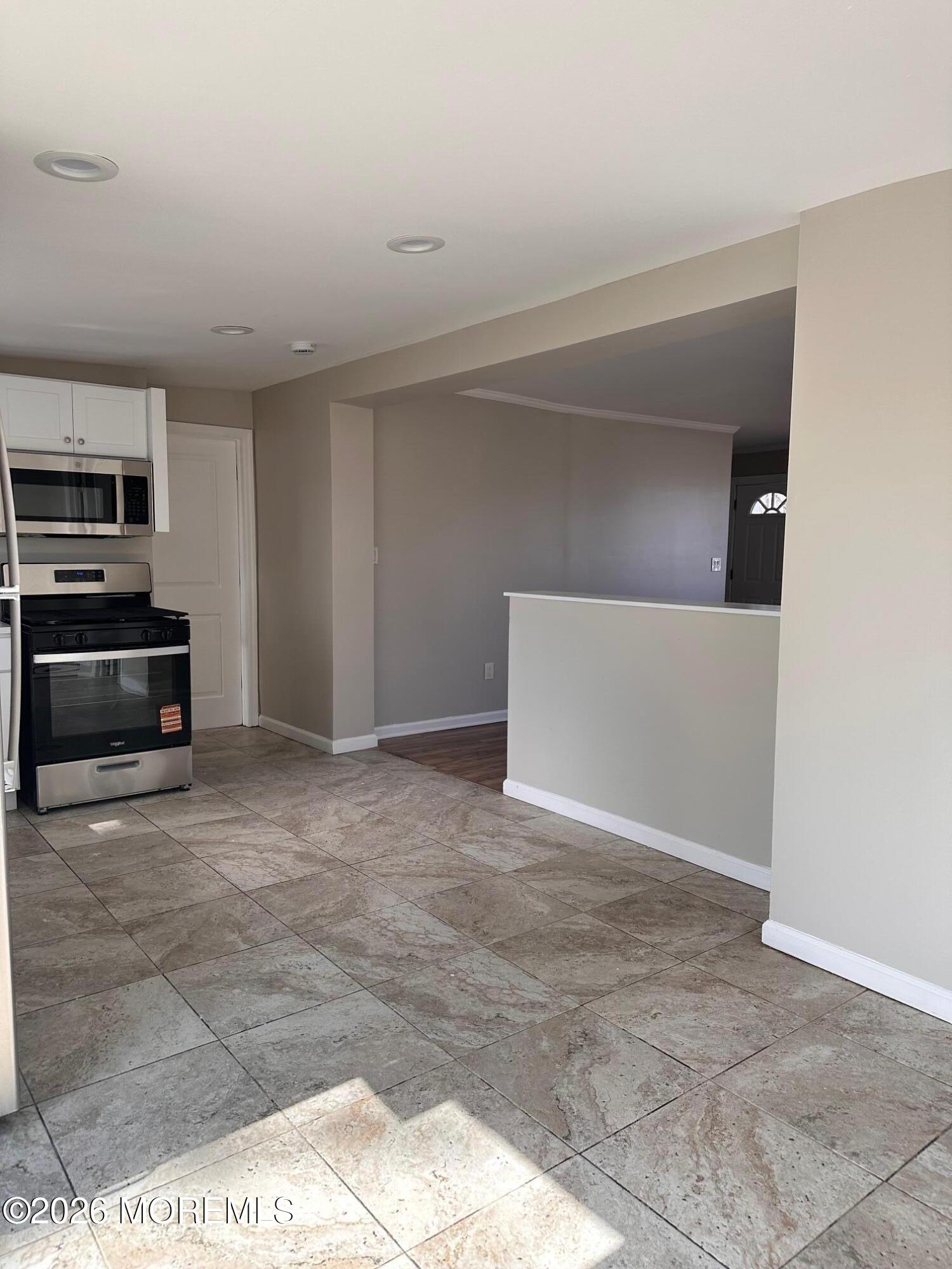 294 19th Avenue Brick, NJ 08724 - Photo 8 of 15 a view of kitchen and microwave