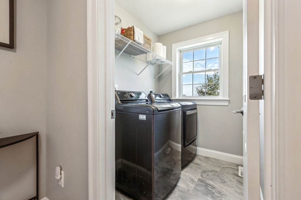 2 Oriole Drive Groton, MA 01450 - Photo 28 of 37 a utility room with stainless steel appliances a refrigerator and a window