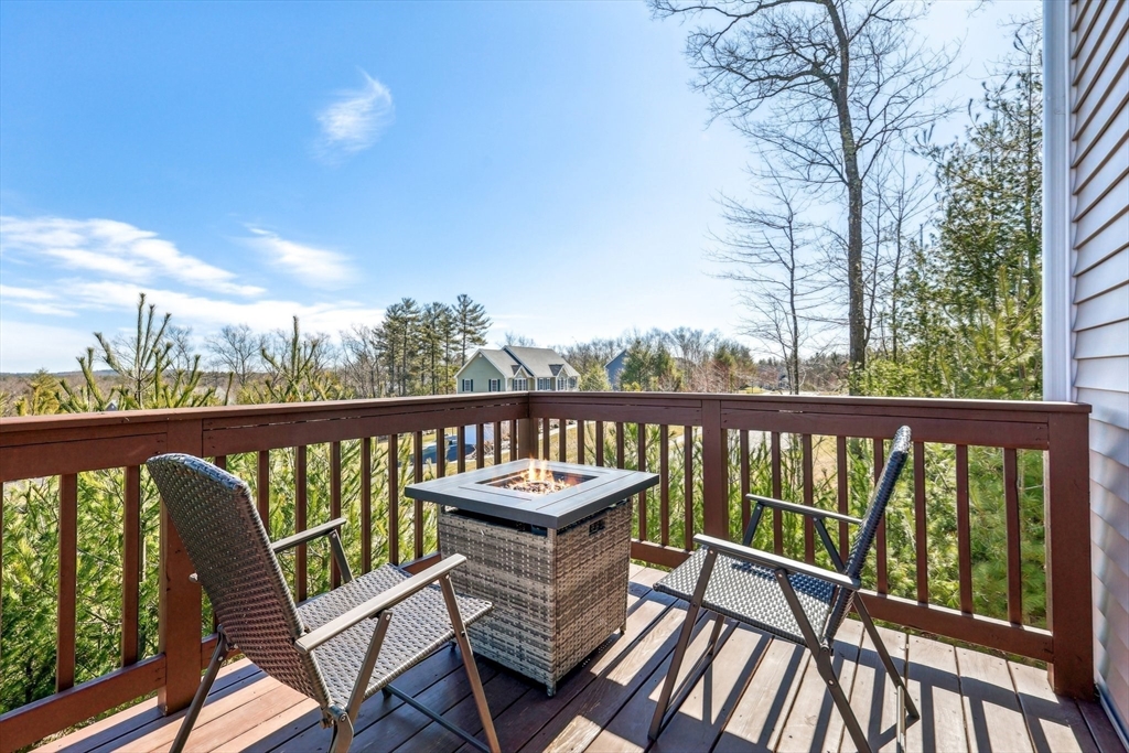 2 Oriole Drive Groton, MA 01450 - Photo 30 of 37 a view of a chairs on wooden deck