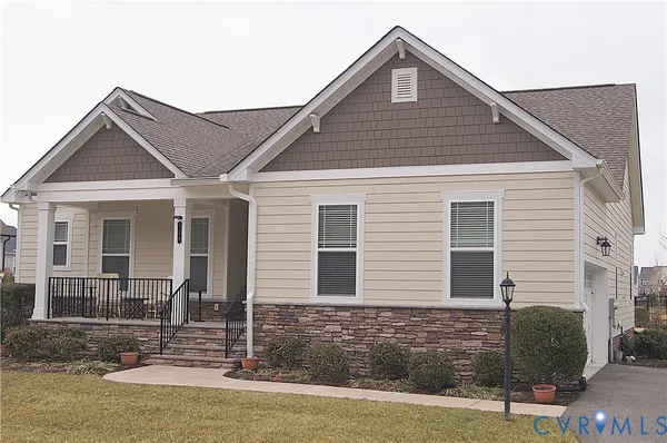 a front view of a house with garage