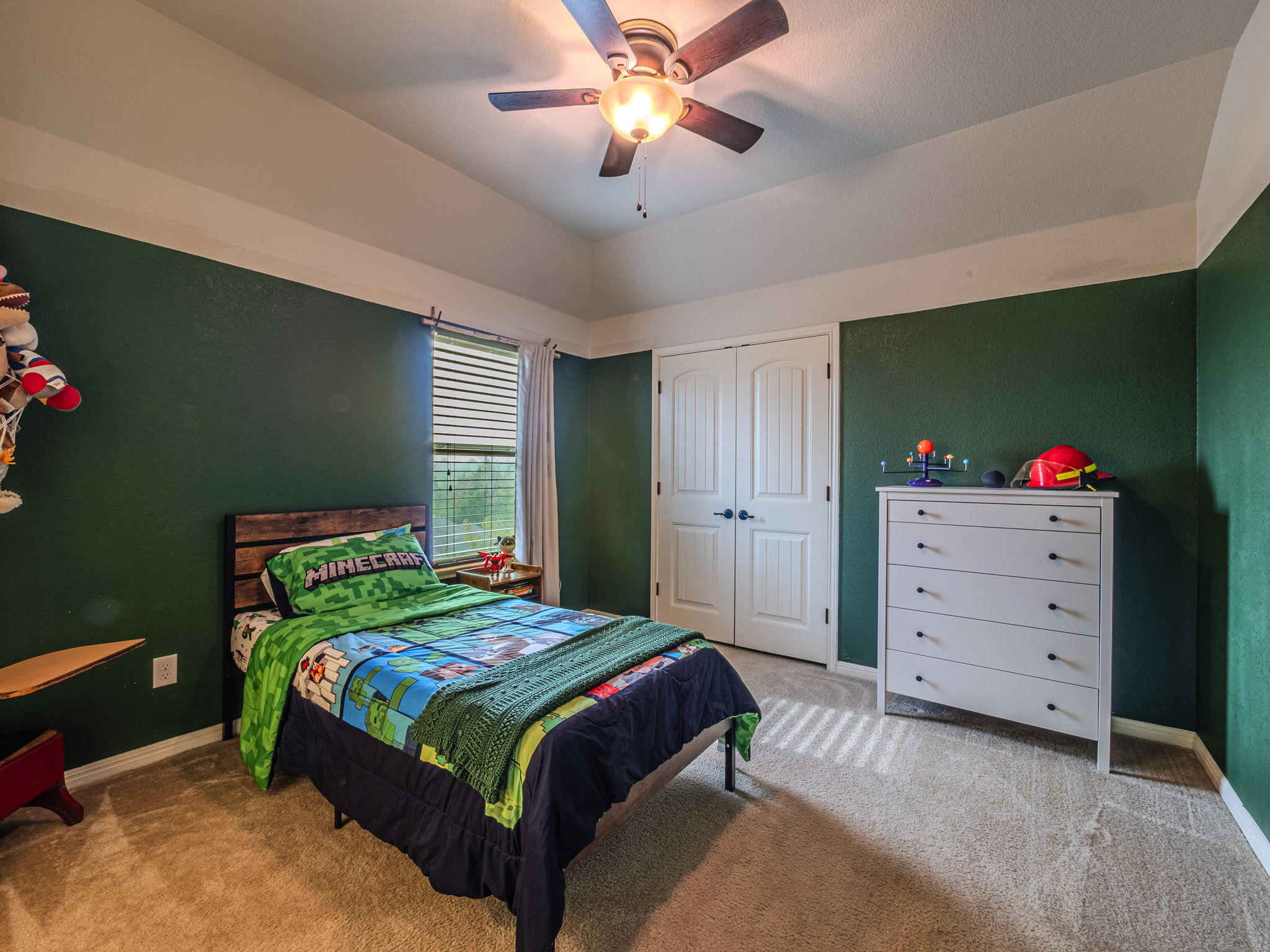 117 Arbor Point Drive Elgin, TX 78621 - Photo 28 of 40 Carpeted bedroom with ceiling fan, a closet, and lofted ceiling