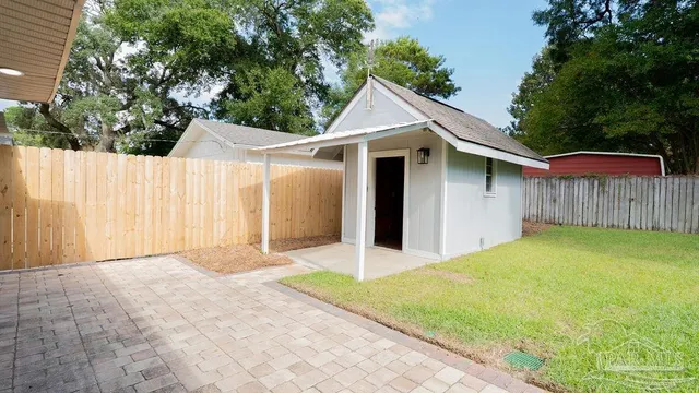a front view of a house with swimming pool