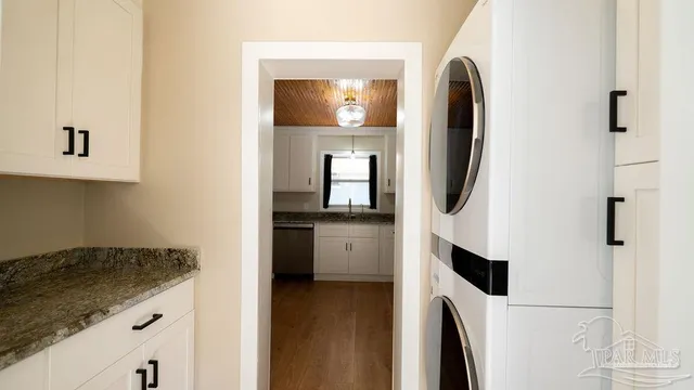 a kitchen with a refrigerator and countertop