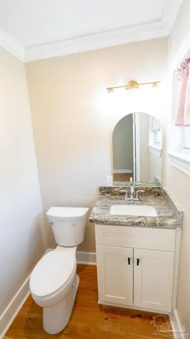 a bathroom with a toilet and a sink