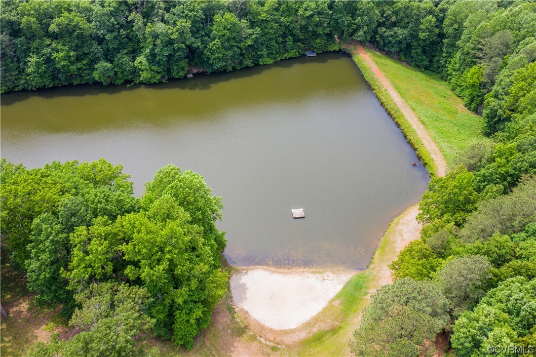 2911 West Brigstock Road Midlothian, VA 23113 - Photo 41 of 50 an aerial view of a house with a yard and lake view