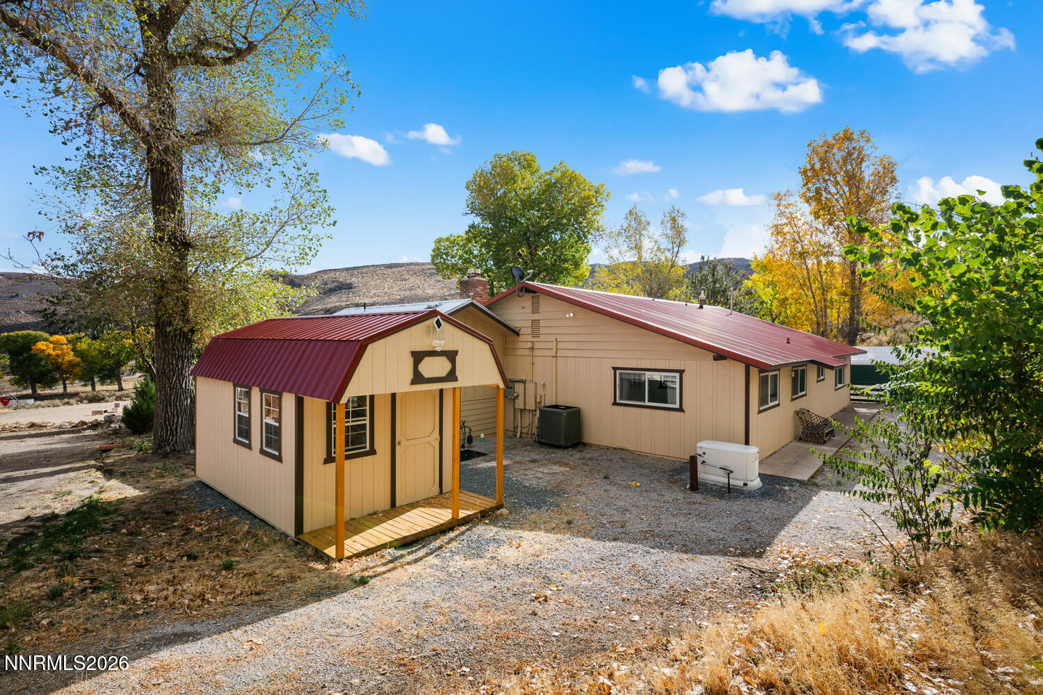 14005 North Red Rock Road Reno, NV 89508 - Photo 17 of 51 a view of a house with a yard