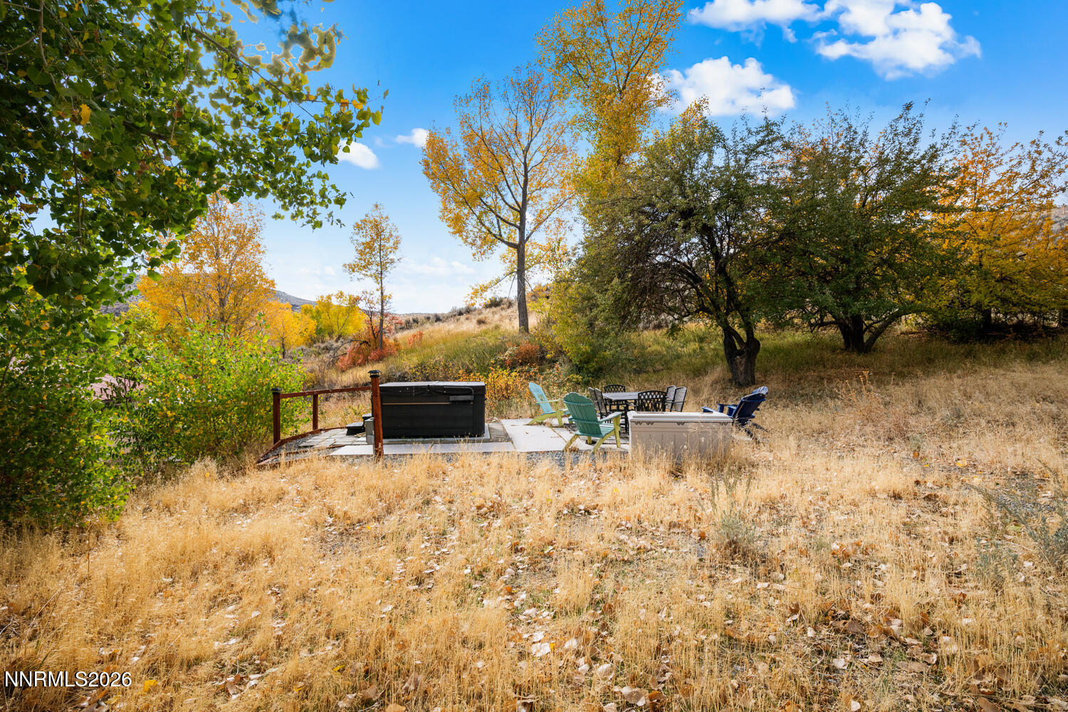 14005 North Red Rock Road Reno, NV 89508 - Photo 18 of 51 a view of a backyard with a patio