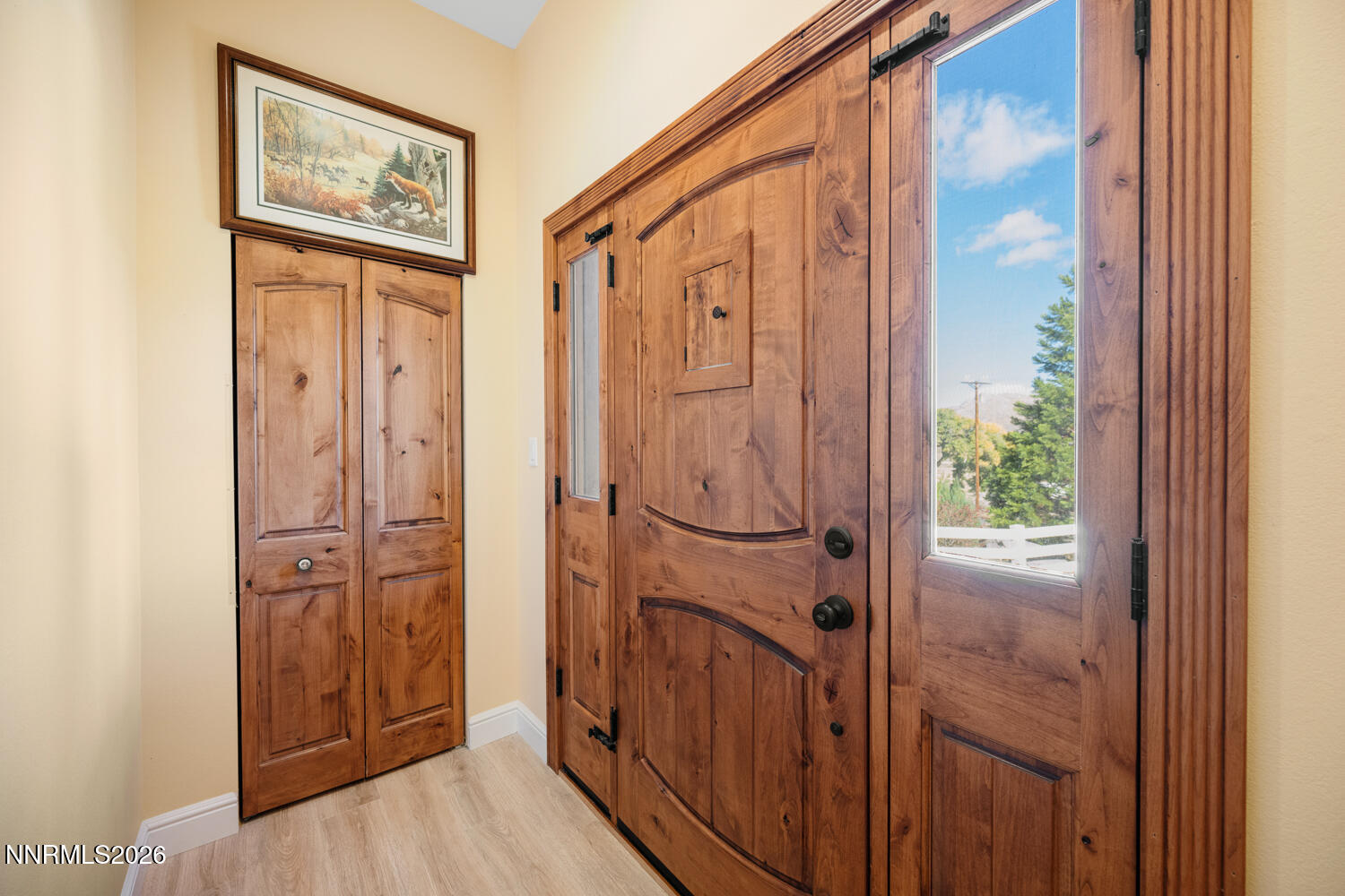 14005 North Red Rock Road Reno, NV 89508 - Photo 27 of 51 a view of a hallway with wooden floor and staircase