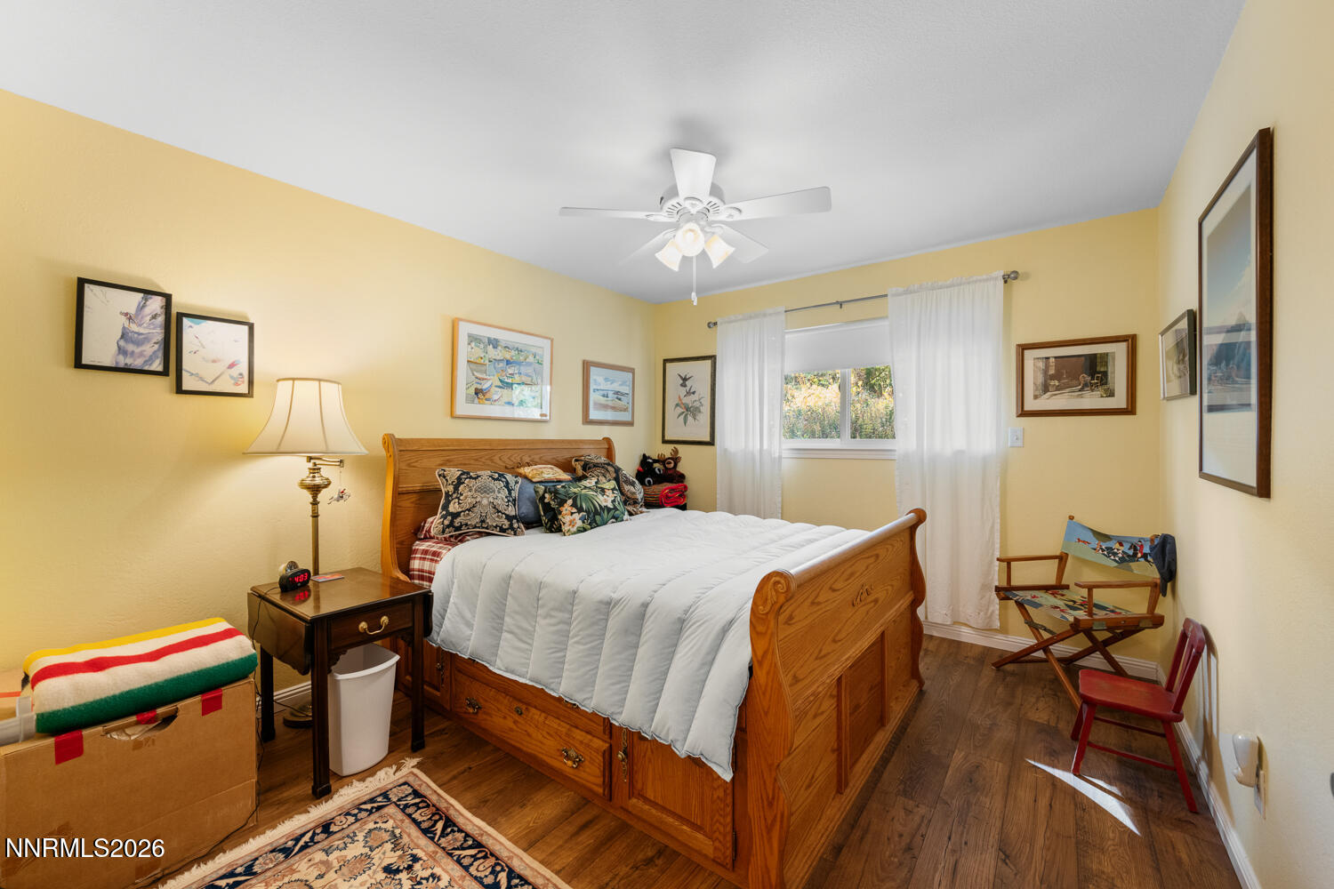 14005 North Red Rock Road Reno, NV 89508 - Photo 50 of 51 a bedroom with a bed and wooden floor