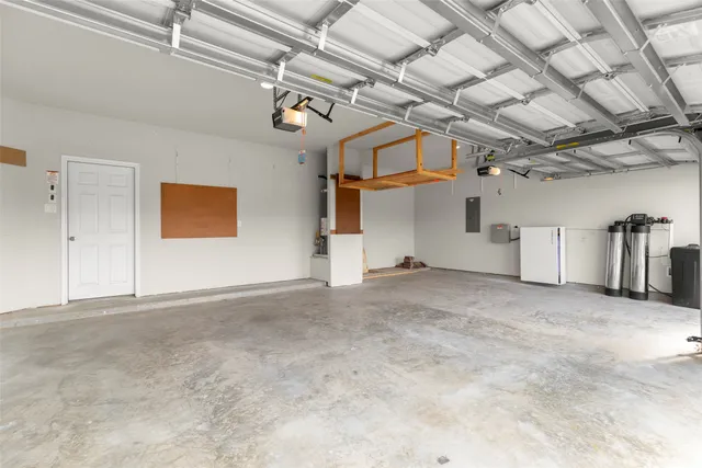 a view of a house with a yard and front view of a house