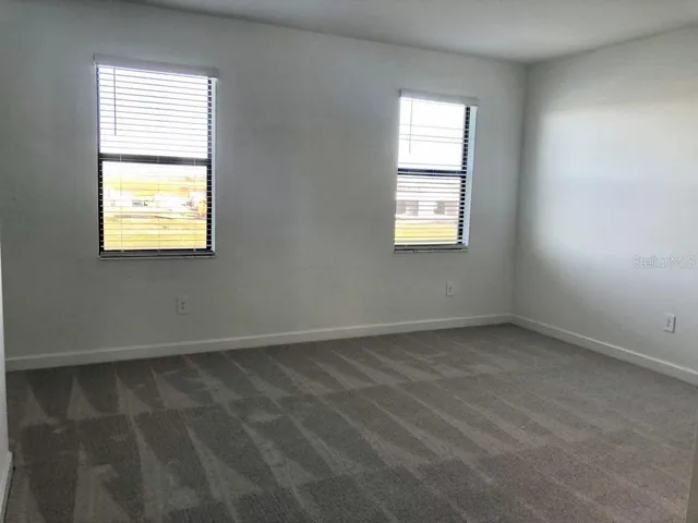 an empty room with a window