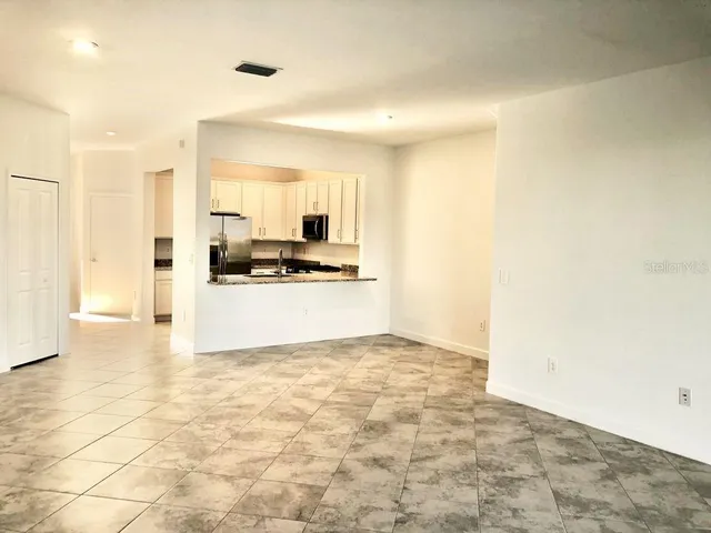 a view of a kitchen with a sink