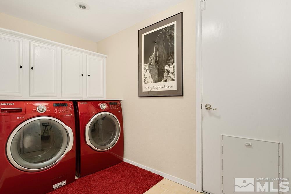 14320 Ghost Rider Drive Reno, NV 89511 - Photo 14 of 40 a utility room with dryer and washer