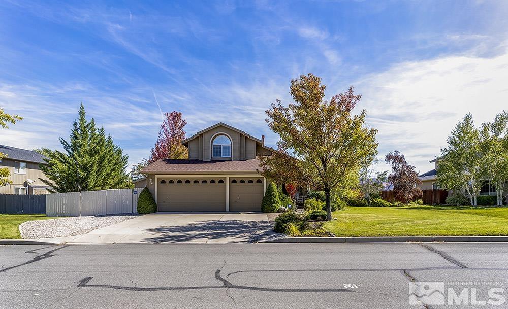 14320 Ghost Rider Drive Reno, NV 89511 - Photo 2 of 40 a front view of a house with a yard