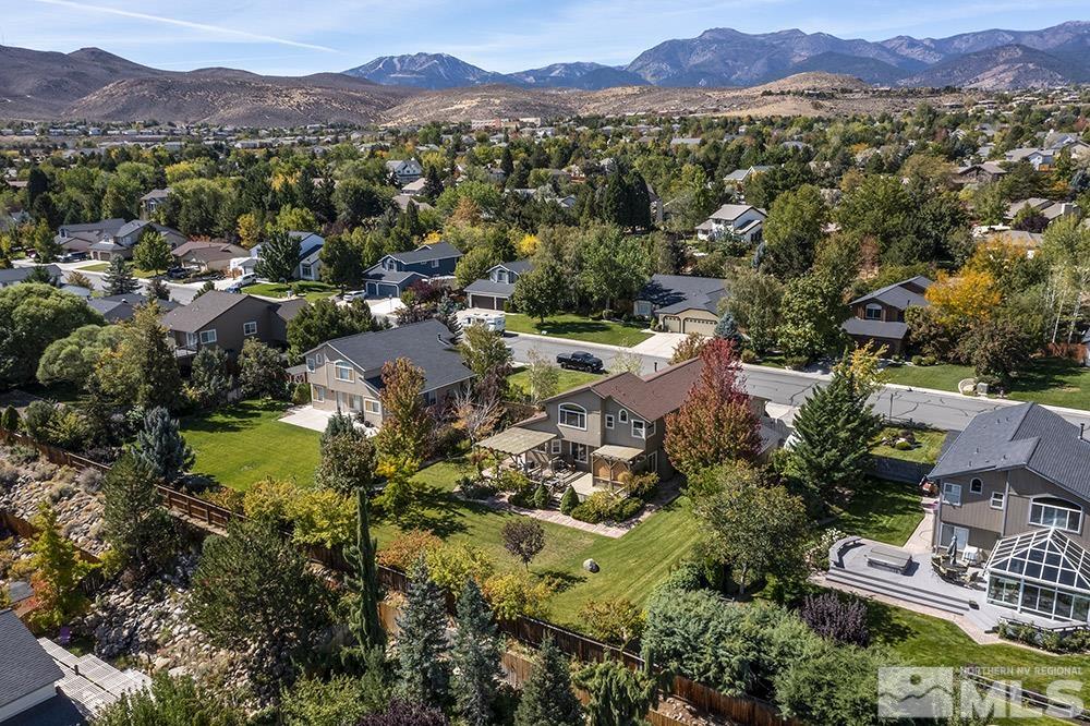 14320 Ghost Rider Drive Reno, NV 89511 - Photo 33 of 40 a view of a city with mountains in the background