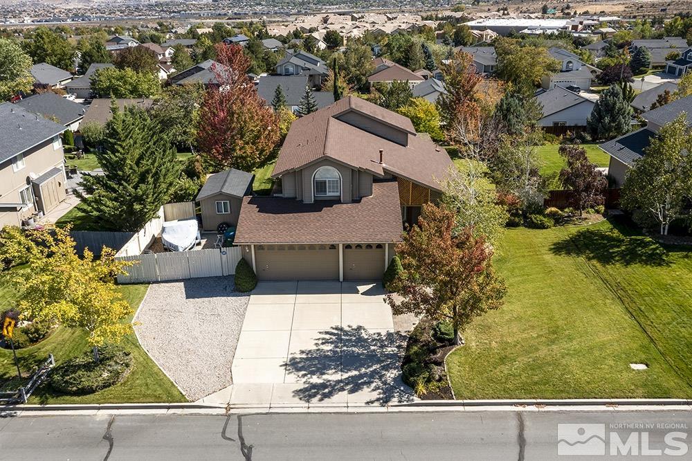 14320 Ghost Rider Drive Reno, NV 89511 - Photo 34 of 40 an aerial view of residential houses with yard